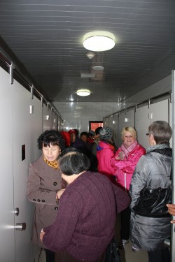 Standing in line for the toilet in China